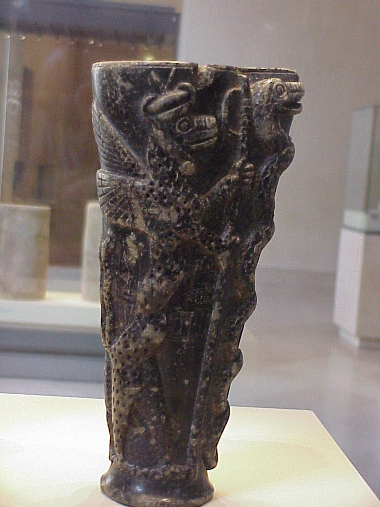 Photo of Libation Cup taken at the Louvre
in 1999 by Chris Tolley